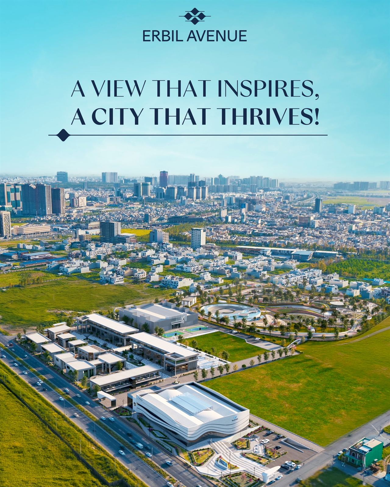 Aerial view of the Erbil Avenue development: low-rise retail buildings, a large curved hall and a landscaped park beside the highway, with the Erbil skyline behind